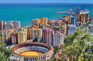 Málaga's colorful buildings, bullring, and port